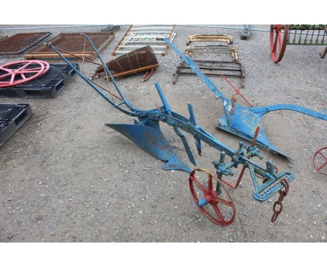 A vintage horse drawn single furrow plough 