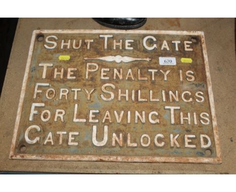 A cast iron sign "Shut The Gate The Penalty Is 40 Shillings For Leaving This Gate Unlocked", approx. 16¼" x 12½"