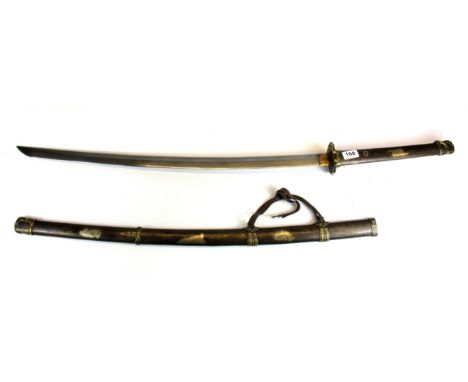 An unusual Japanese katana sword, L. 102cm, with scabbard and hilt featuring erotic decoration.