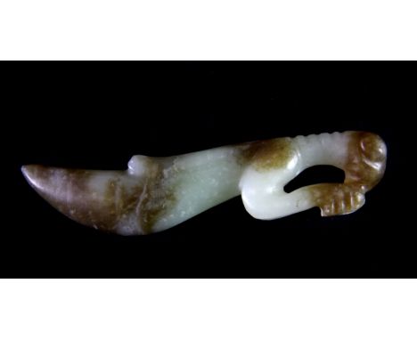 A 19th/ early 20th century Chinese mixed colour nephrite jade figure of a cricket with celadon and russet tones, L. 9.5cm.
