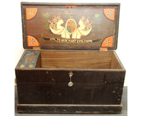 A superbly decorated 19th century hardwood cabin trunk with armorial decoration inside the lid, 93 x 45 x 49cm.