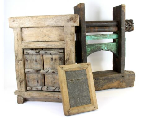 An early print roller, H. 40cm, together with a miniature wooden door and frame.