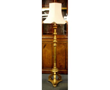 A lovely Edwardian carved gilt wood standard lamp and shade, H. 184cm.