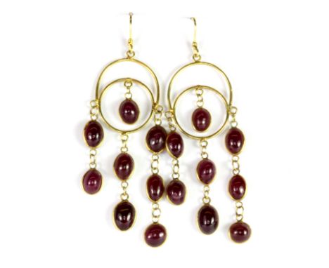 A pair of 14ct yellow gold ruby set drop earrings, L. 6.1cm.