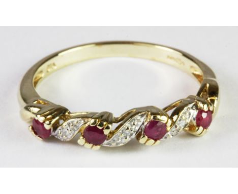 A 9ct yellow gold ruby and diamond set half eternity ring, (O.5).