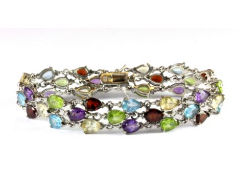 A 925 silver bracelet set with amethyst, peridot, topaz. garnet and citrine.