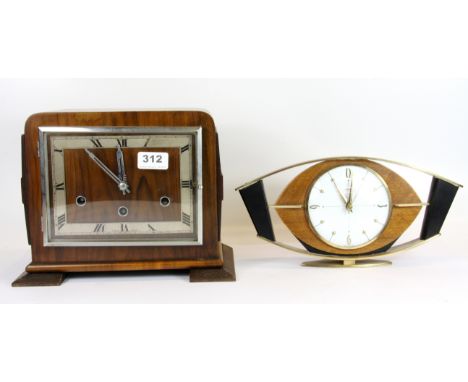 An Art Deco walnut veneered mantle clock and a 1960's brass and walnut mantle clock.