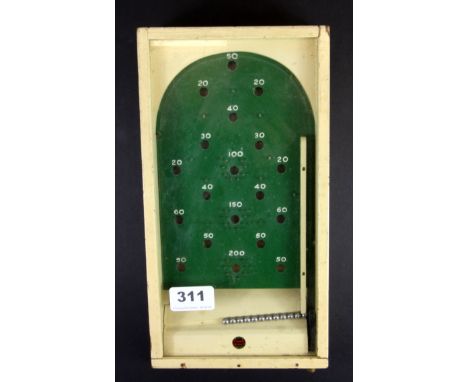 A vintage miniature wooden Chad Valley Bagatelle game, 15 x 28cm.