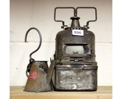 Railway interest. An early railway oil lamp by Adlake and lamp filler can.