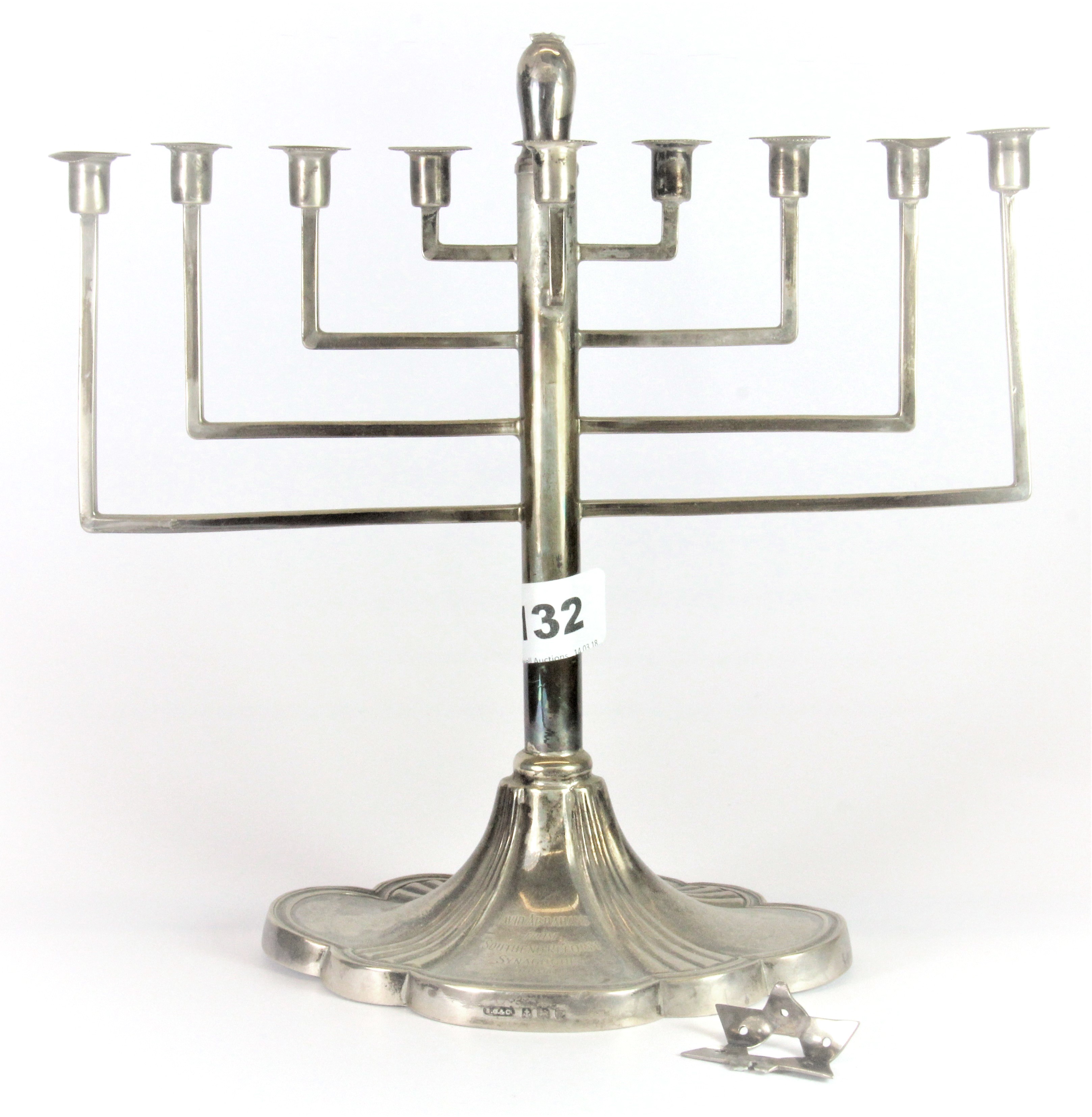 Judaic interest. A hallmarked silver menorah, W. 26cm.