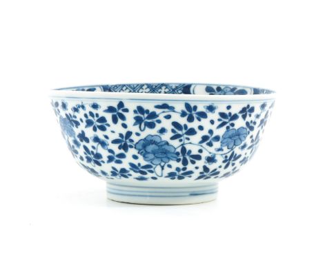 Decorated with flowers, marked with double ring and sacred fungus, 15 cm. in diameter, hairline.