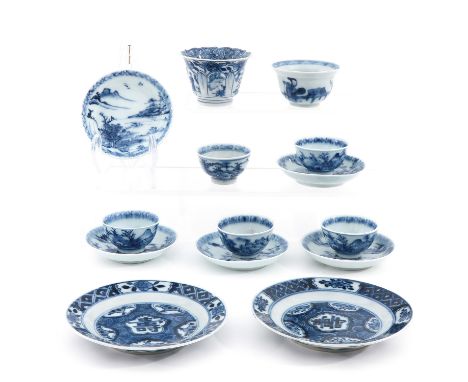 Blue and white decors, including 7 cups and 7 saucers, largest plate is 10 cm. is cm. in diameter. 