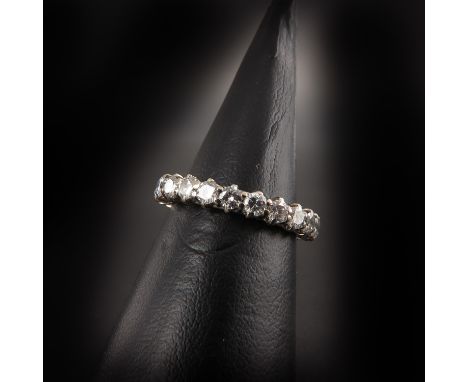 Diamonds are approximately 3 mm. in diameter, ring size 17.