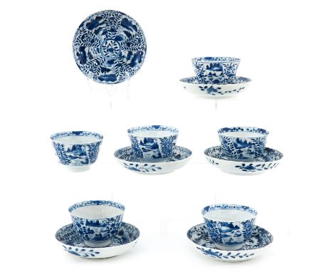 Floral decor, Qianlong mark, saucers are 12 cm. in diameter, chip and hairline.