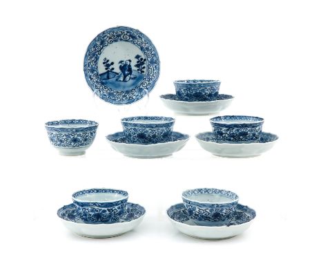 Depicting Chinese man in garden holding flowers, saucers are 13 cm. in diameter, chip.