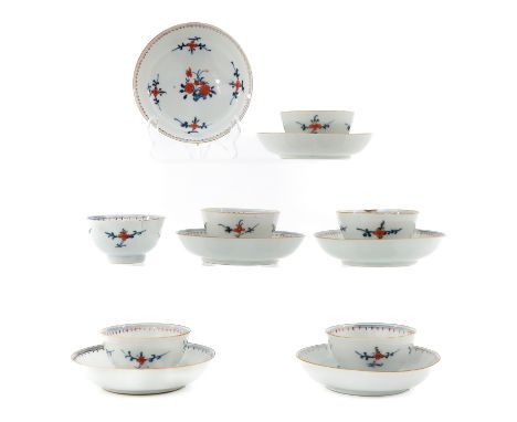 Floral decor, saucers are 12 cm. in diameter, chip and hairline.
