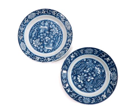 Decorated with peacocks and phoenix, marked with double ring and flower, 21 cm. in diameter, chip.
