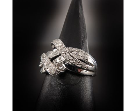 0.30 carat total weight in diamonds, ring size 17.5