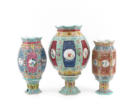 Including 3 lanterns in Famille Rose enamels, decorated with flowers and Chinese figures, tallest lantern is 40 cm., chip.