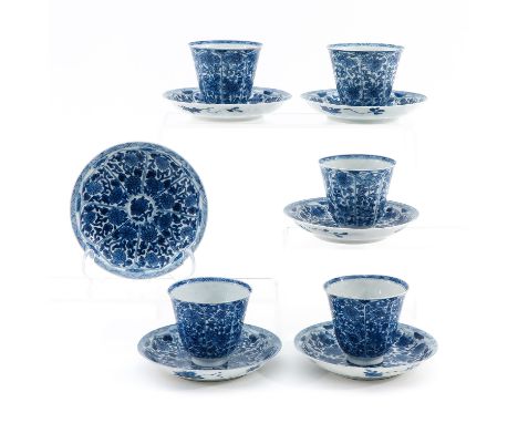 Including 5 cups and 6 saucers, floral decor, 18th Century, saucers are 13 cm. in diameter, chip and hairline.