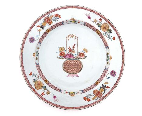 Depicting flowers in basket in center of charger with Chinese antiquities on border, 44 cm. in diameter. 