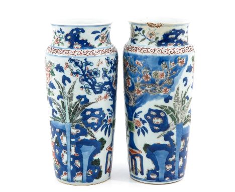 Depicting scene with Chinese antiquities, 24 cm. tall, one vase restored. 