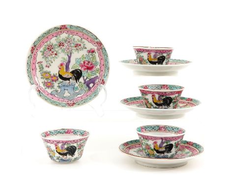 Decorated with roosters and flowers, saucers are 11 cm. in diameter. 