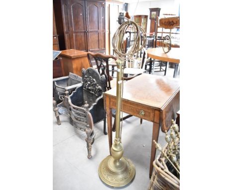 A vintage brass standard lamp