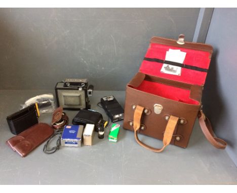 Graflex camera with Kalark synchronized range finder, together with accessories, light meter in original leather case & 1 vol