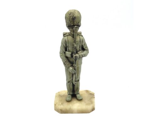 A novelty lighter with alabaster base, 205mm tall