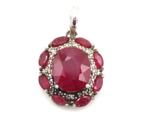 A silver pendant set with ruby & diamond, main stone 11.75mm x 9.75mm, drop 26.5mm, 4.2g