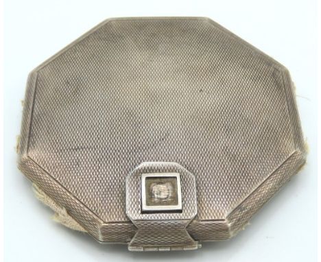 A London silver compact, loss of enamel or stone on clasp, 86.1g