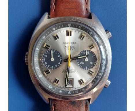 A gent's stainless steel Heuer Carrera Automatic Chronograph, having silvered dial, two subsidiaries and date indicator, crow