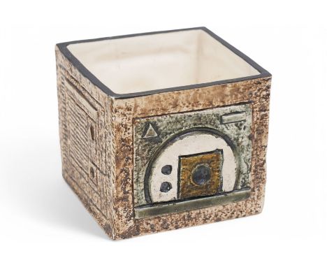 Troika cube vase, with incised geometric decoration in green and cream on a mottled light brown ground, signed to base with i