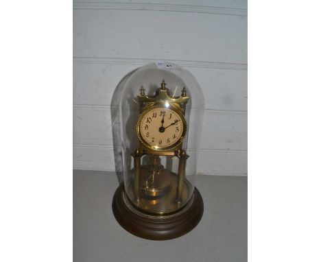 Brass anniversary clock under glass dome