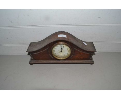 Early 20th Century oak cased mantel clock of arched form