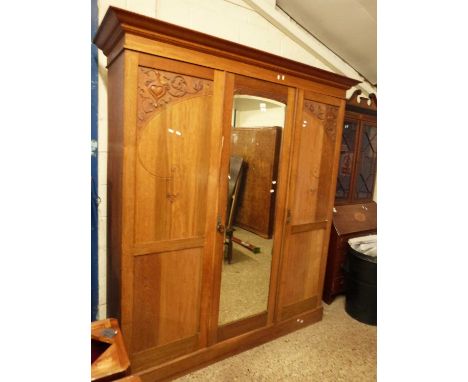 Late Victorian light oak wardrobe with central mirror