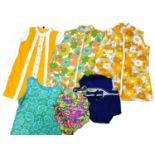 A quantity of mid 20th Century swimwear and beachwear to include two bikinis and four toweling beach