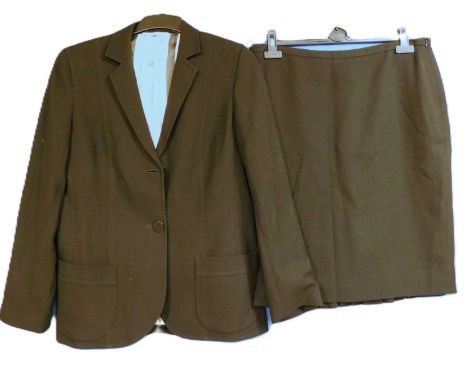 A lady's two piece suit by Paul Costelloe Collection, the black single breasted with patch pockets size 14 together with a kn