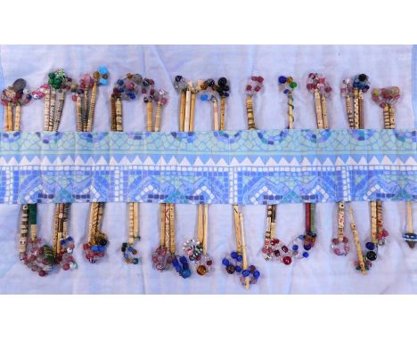 A quantity of lace bobbins, all bone, all decorated and patterend with beaded spangles, to include a single Tonder bobbin, ap