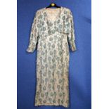 A mid 20th century blue beaded shift dress and matching bolero jacket by Mandell Couture