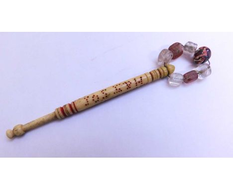 A 'hanging bobbin', carved in bone with pierced decoration 'JOSEPH CASTLE HUNG 1860', with beaded spangleJoseph Castle was hu
