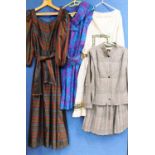 Four items of mid to late 20th Century lady's wear: to include a black and white two piece suit by