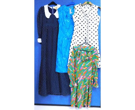 Four mid 20th Century dresses to include a black and white polka dot sleeveless dress by Cresta Couture, size 14, a navy and 