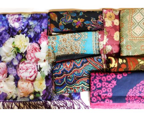 A quantity of assorted scarves to include a purple floral printed silk scarf and others (8)