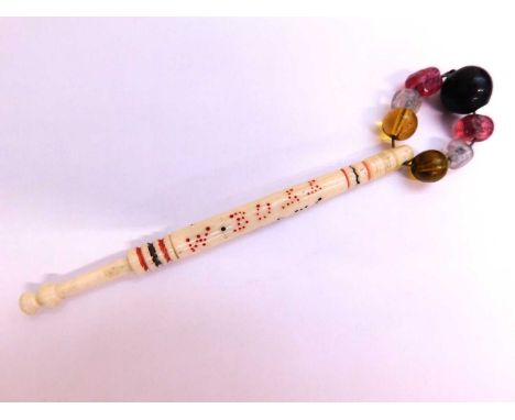 A 'hanging bobbin', carved in bone with pierced decoration 'W. BULL HUNG 1871', with beaded spangleWilliam Bull was hung 3rd 