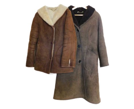 Two sheepskin coats, both single breated with front patch pockets, approx. 36 - 40" chest