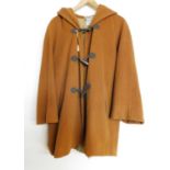 A mid 20th century Italian wool hooded swing coat by Mani, single breasted with faux horn duffle
