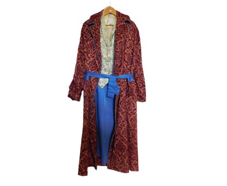 A gentleman's dressing gown, in burgundy and orange damask style material with blue trim and tie waist, together with a Chino
