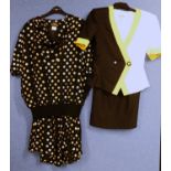 Two 1980's lady's suits, to include a black, white and yellow short sleeved skirt suit by Kasper